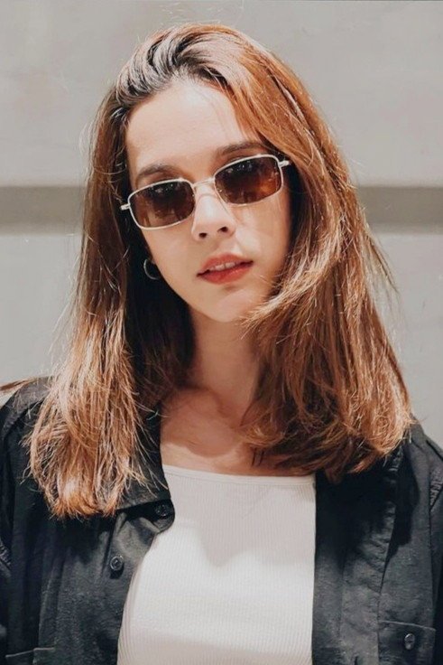 Lilly Sarinya Olsson official photo - Thai actress, star of Payback (2026) as Karn