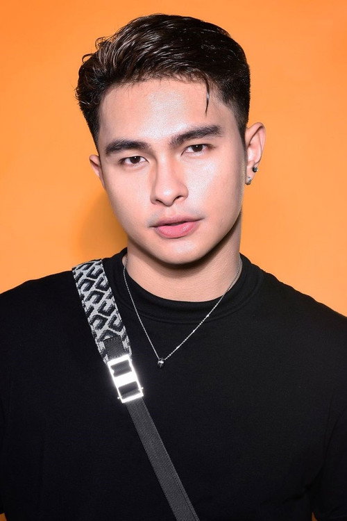 Portrait photograph of Filipino actor Tim Tuppil